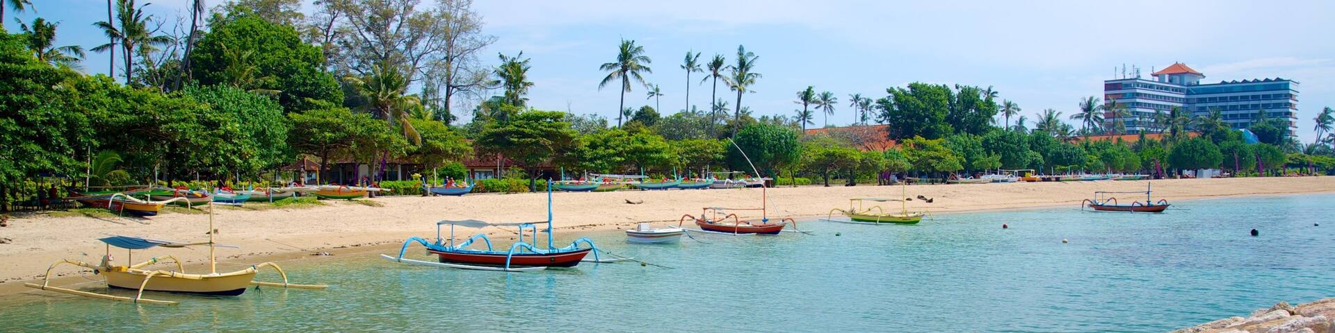 Segara Beach featuring boating, tropical scenes and a bay or harbour