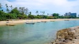 Segara Beach featuring boating, tropical scenes and a bay or harbour