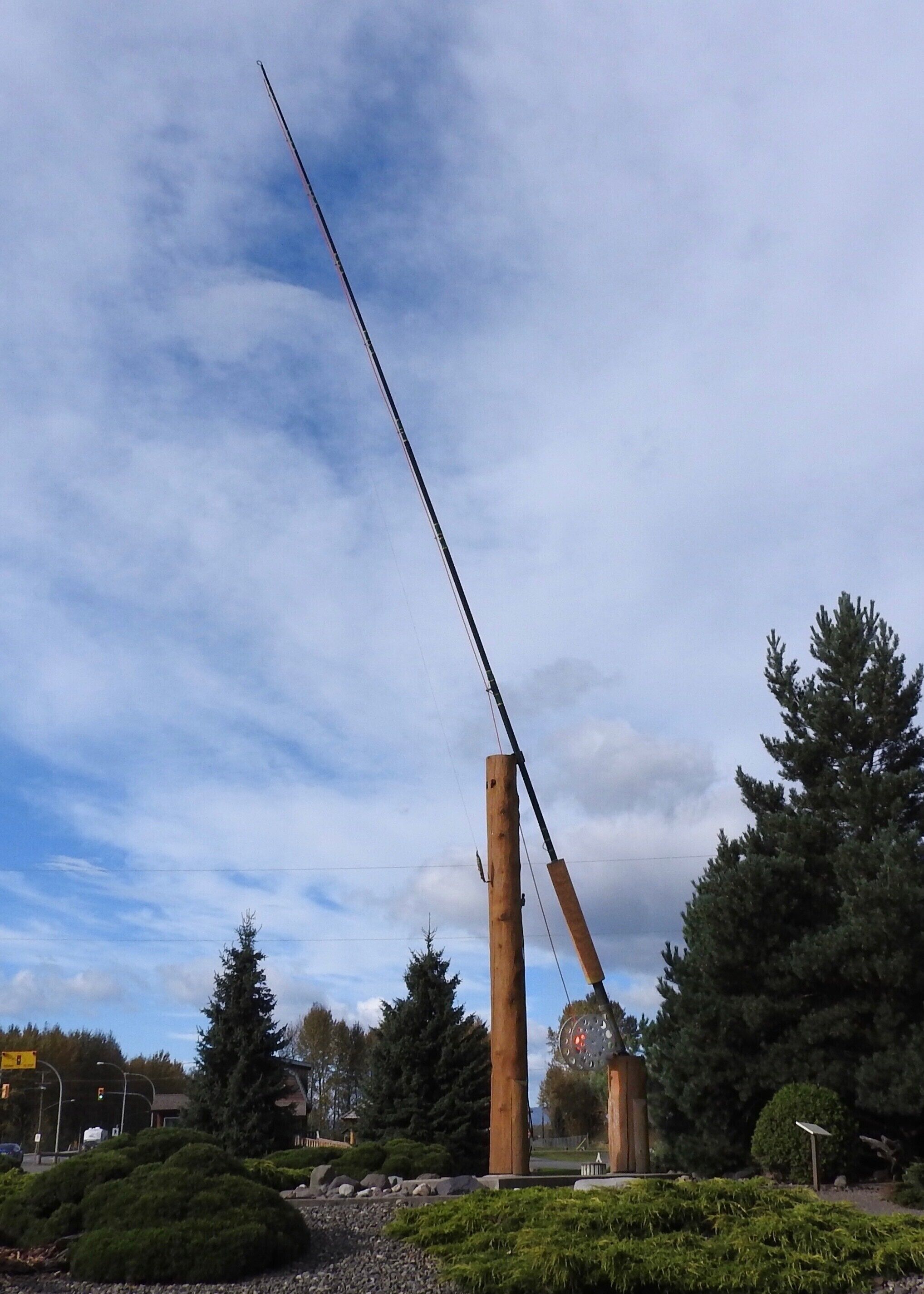 The World's Largest Fly Rod, located in Houston's Steelhead Park, is a beacon for travelling fly-fishers and a symbol of Houston's community spirit. It measures 18 metres and weighs about 360 kilograms, with a reel that has a diameter of 90 centimetres. (September 2016)