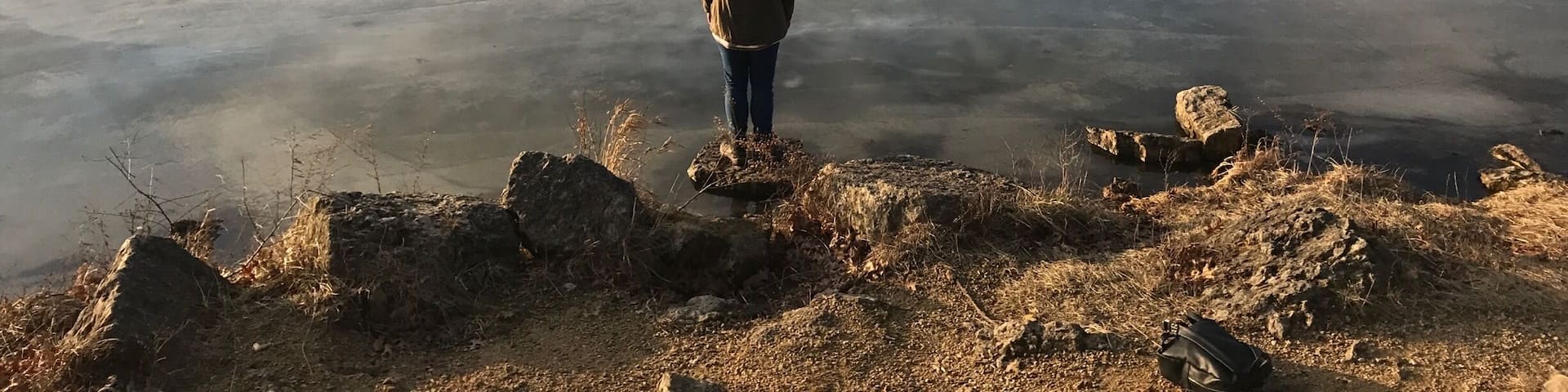 I took this of my Twin sister. I love how the frozen lake looks at this time of day.