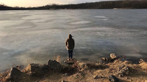 I took this of my Twin sister. I love how the frozen lake looks at this time of day.