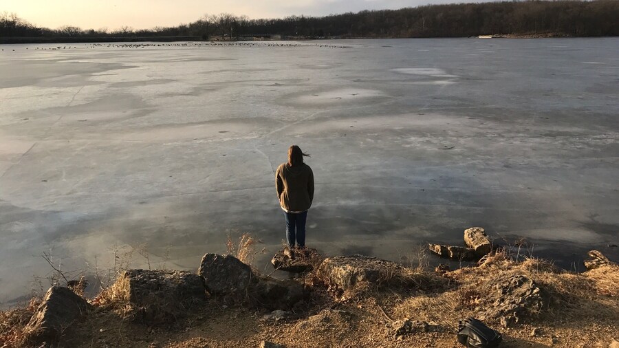 I took this of my Twin sister. I love how the frozen lake looks at this time of day.