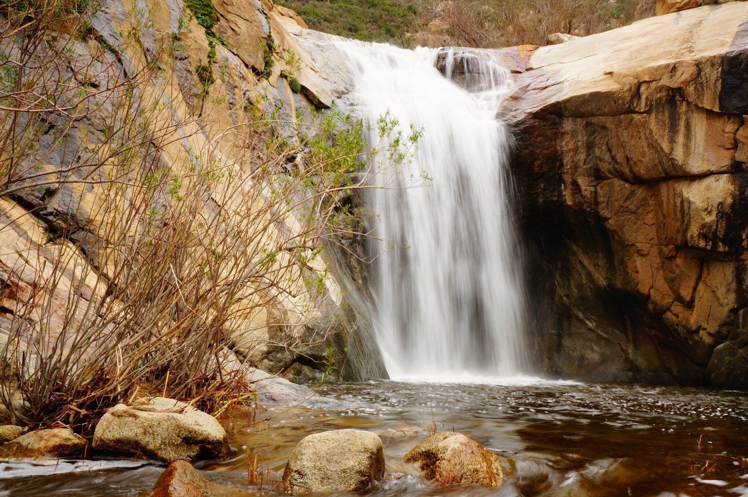 This is a great hike! lots of boulders to jump around on, This waterfall is at the top of the sisters and if it hasn't rained in a while... there's no water! I took this pic today straight after it rained this week! hike takes 3-4 hrs from car to falls and back, but leave an hour or so for lunch! Enjoy.