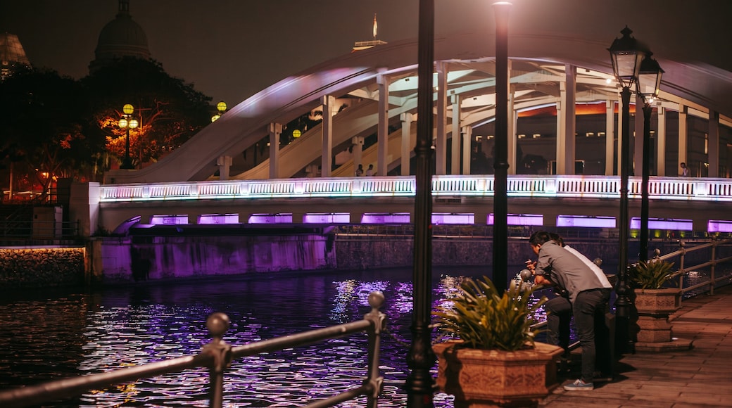 Clarke Quay Mall showing a river or creek, a bridge and night scenes