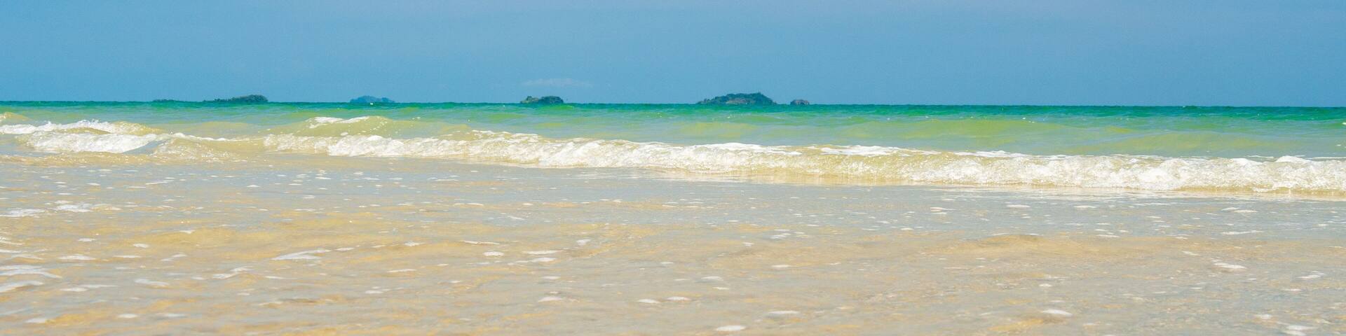 Beautiful Landscape summer beach front viewpoint Clear blue sea, blue sky overlooking "Suan Son Beach" in sea east Bay, Rayong Thailand On clear day white clouds during holidays. Suitable relaxing