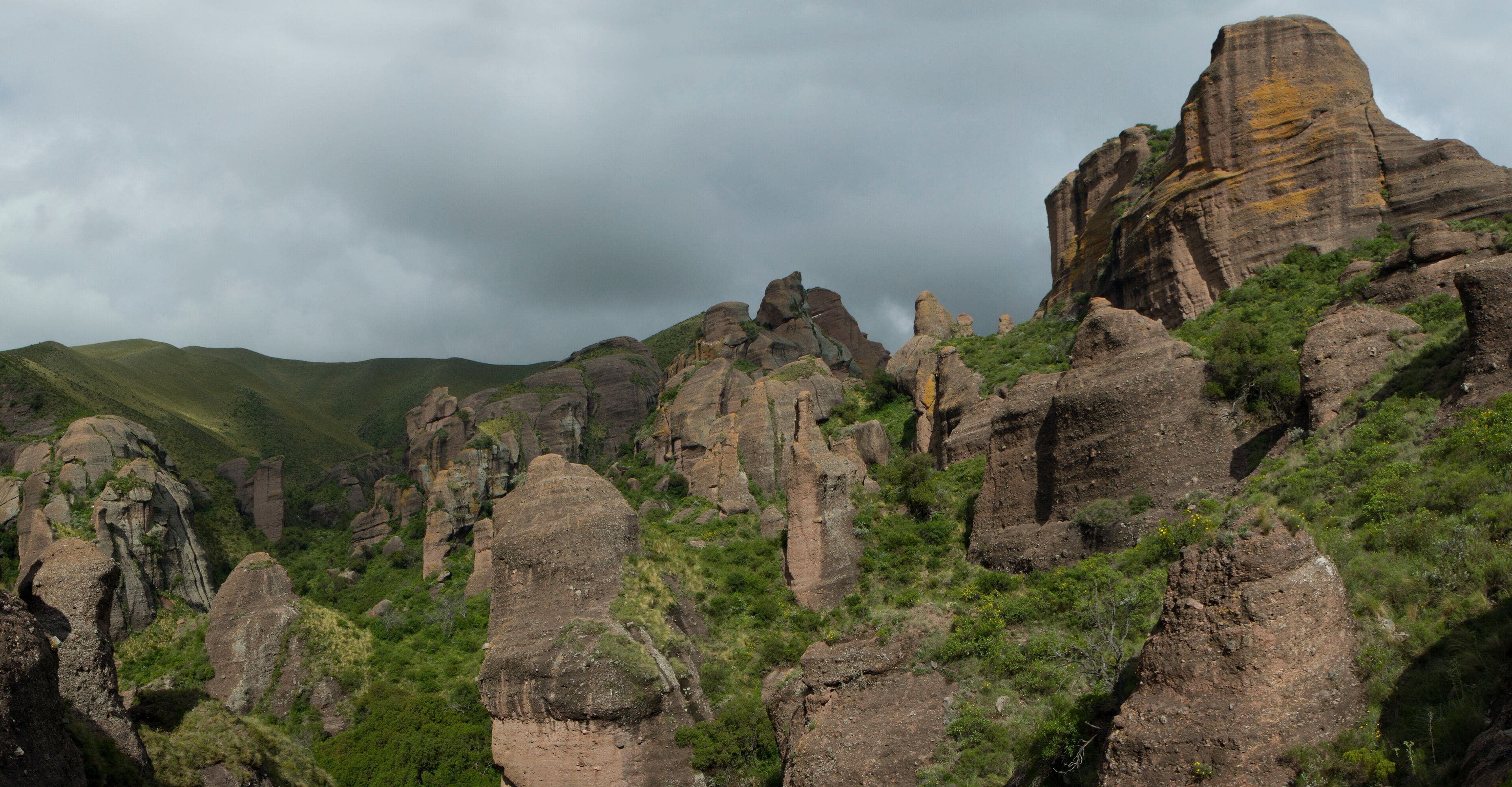 Panorama view of the mountains, green forest and rock formations called Los Terrones, in Cordoba, Argentina. 