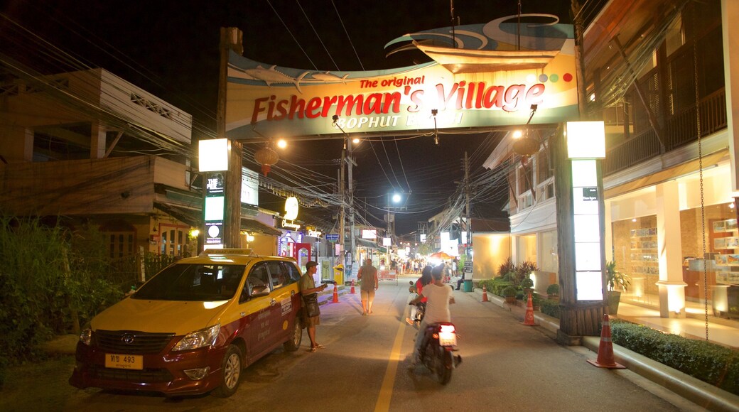 Ciudad de los Pescadores que incluye escenas nocturnas