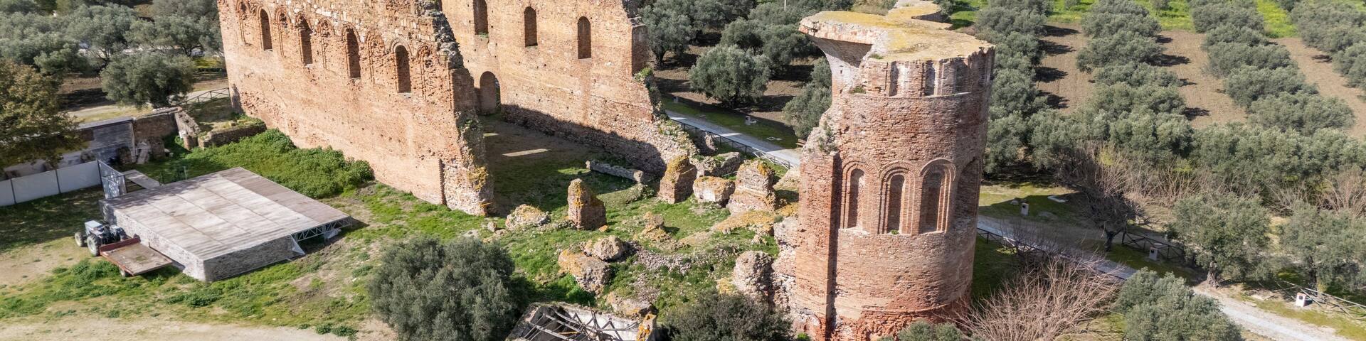 Aerial View of Ancient Ruins of Scolacium Archaeological Park With Olive Trees
