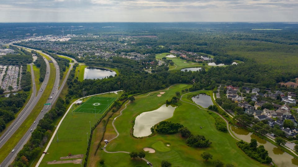 Aerial photo Celebration FL golf course landscape near highways