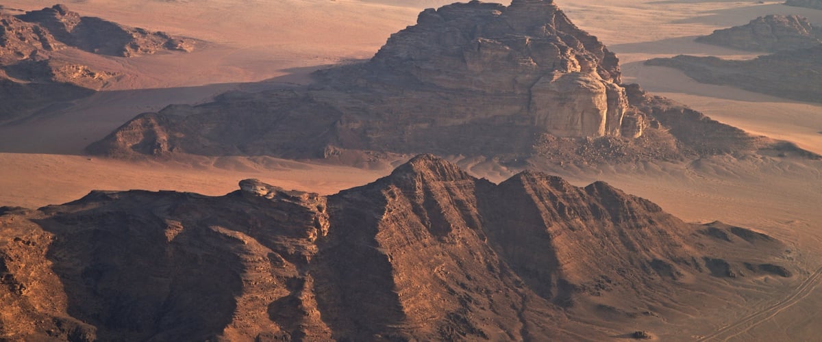 Wadi Rum featuring a gorge or canyon, landscape views and desert views