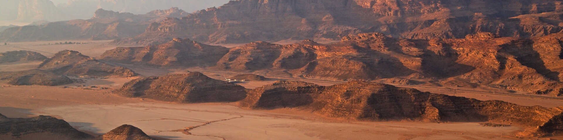 Wadi Rum showing landscape views, a gorge or canyon and desert views