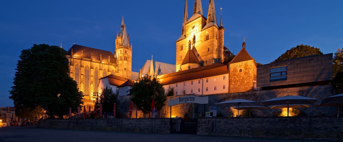 Erfurt Cathedral which includes heritage architecture, night scenes and a city