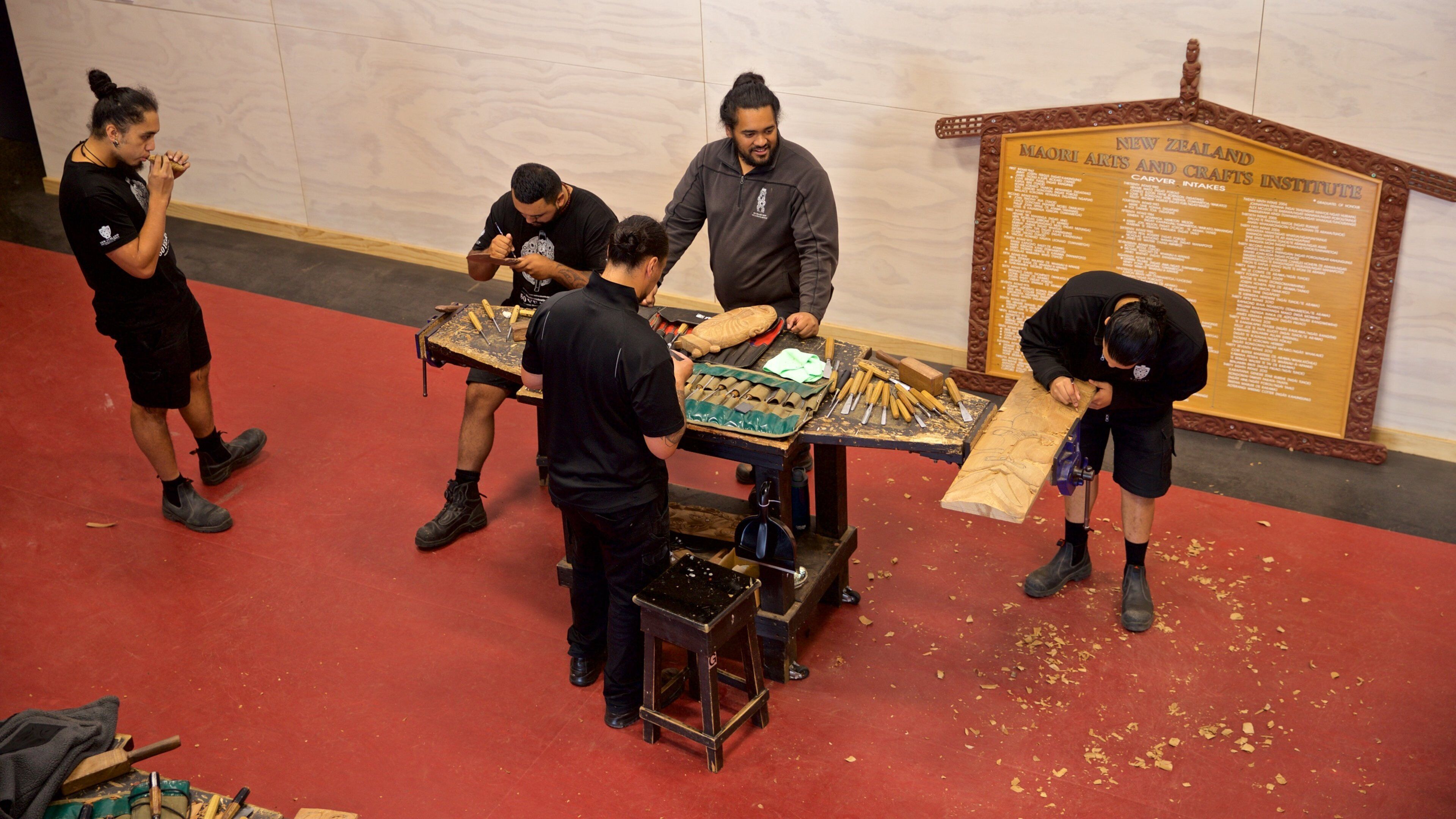 Te Puia New Zealand Maori Arts and Crafts Institute showing interior views as well as a small group of people