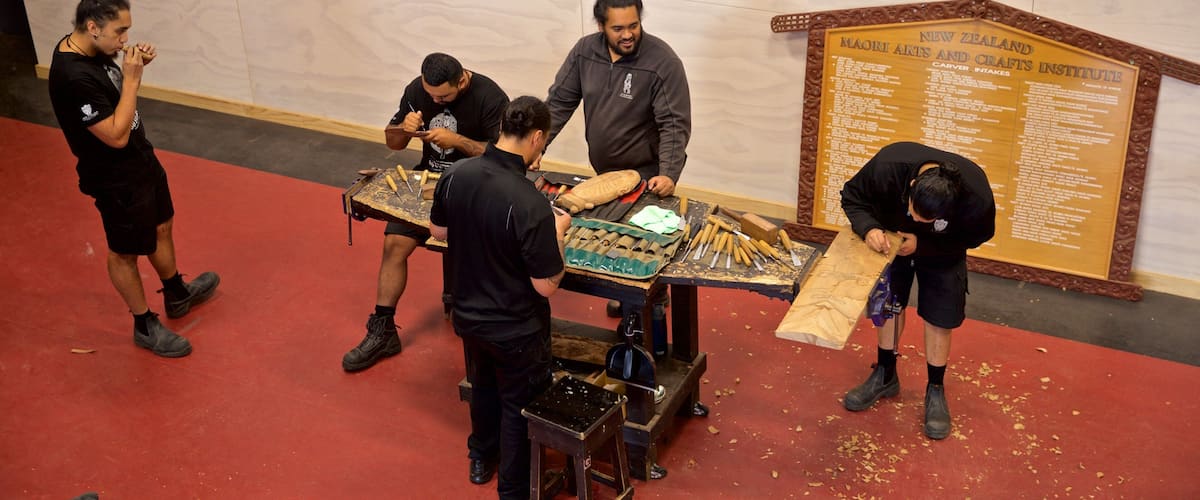 Te Puia New Zealand Maori Arts and Crafts Institute showing interior views as well as a small group of people