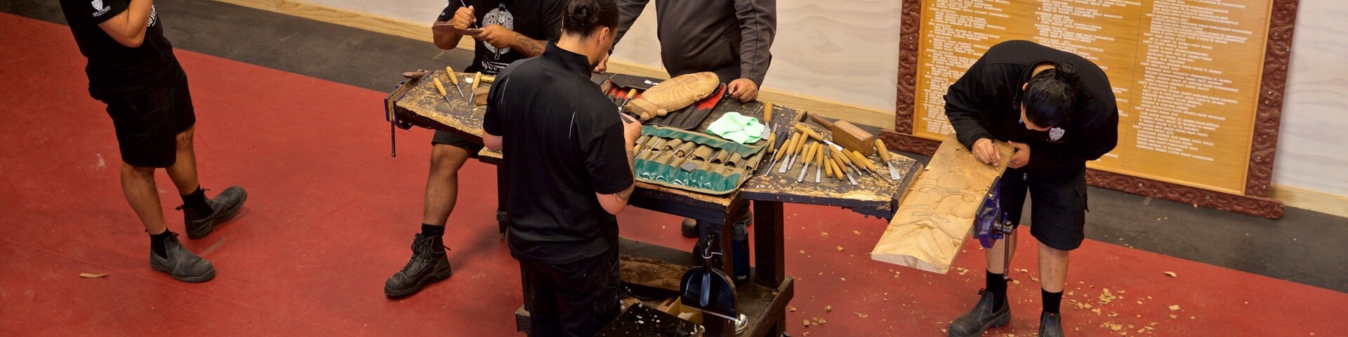 Te Puia New Zealand Maori Arts and Crafts Institute showing interior views as well as a small group of people