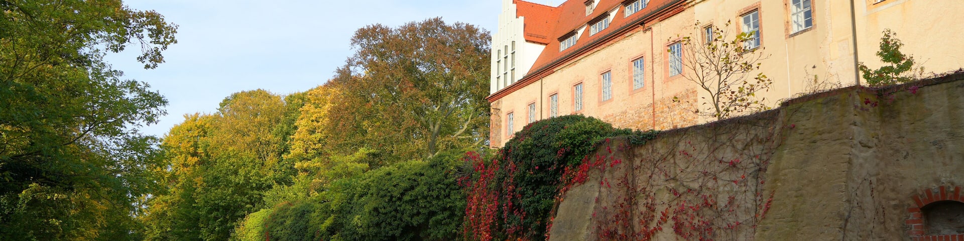 Castle in Trebsen, Germany beautiful autumn scene with colorfull trees and vegetation
