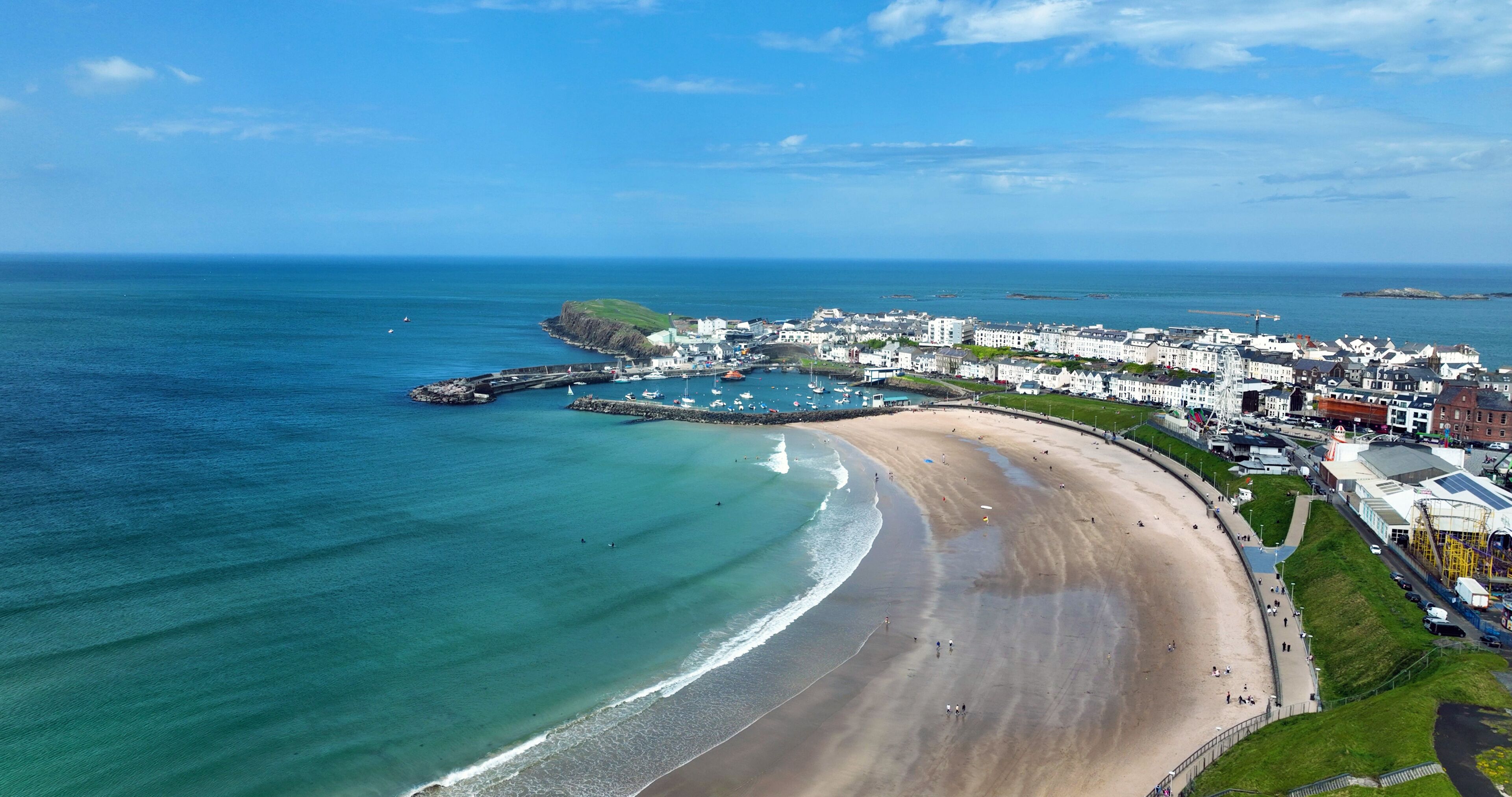 Aerial photo of Portrush Beach Atlantic Ocean North Coast County Antrim Northern Ireland by drone