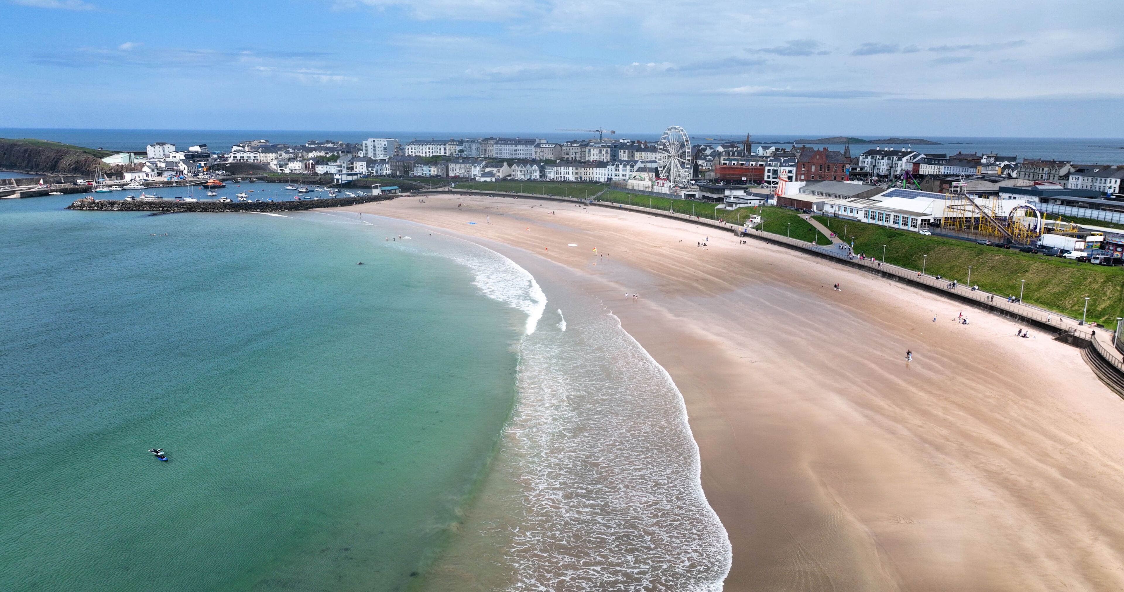 Aerial photo of Portrush Beach Atlantic Ocean North Coast County Antrim Northern Ireland by drone