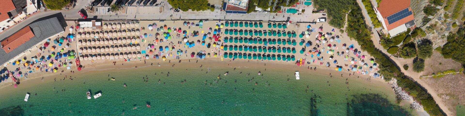 Amazing overhead aerial view of Cavoli Beach, Elba Island in summer season, Italy