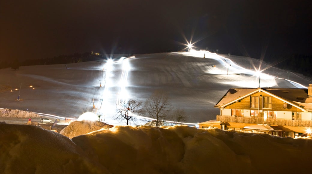 Feldberg Ski Resort featuring night scenes, a luxury hotel or resort and snow