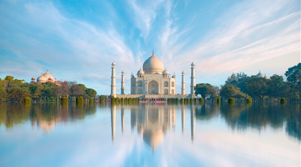 Panoramic view of Taj Mahal during bright blue sky reflected in water - Agra , Uttar Pradesh, India