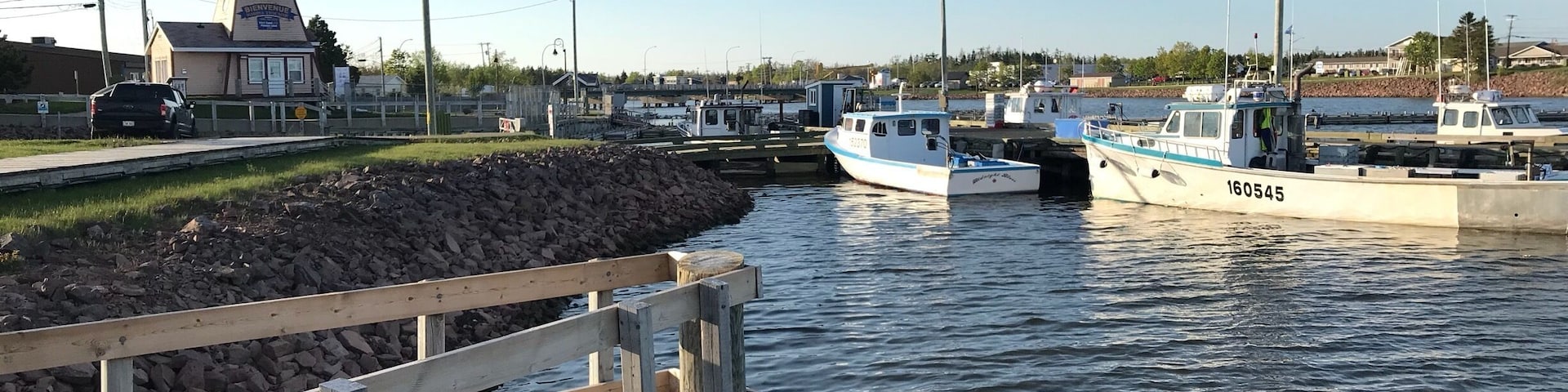 Nice little boardwalk on the river, near fishing docks and restaurants.