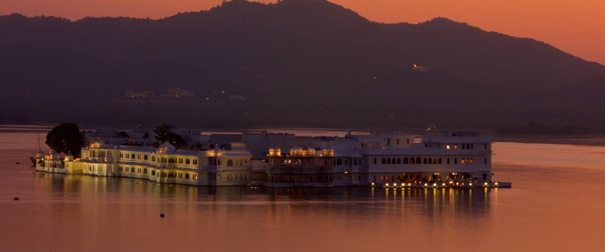 Lake Palace featuring a coastal town, a sunset and general coastal views