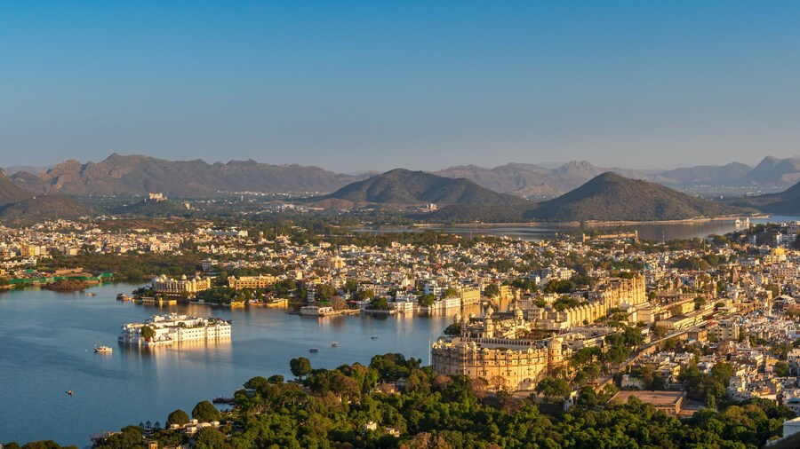 Panoramic aerial view of Udaipur city also known as city of lakes from Karni Mata Temple, Rajasthan. Udaipur city is a popular honeymoon destination among tourist in India.