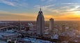 Downtown Mobile, Alabama riverside skyline at sunset