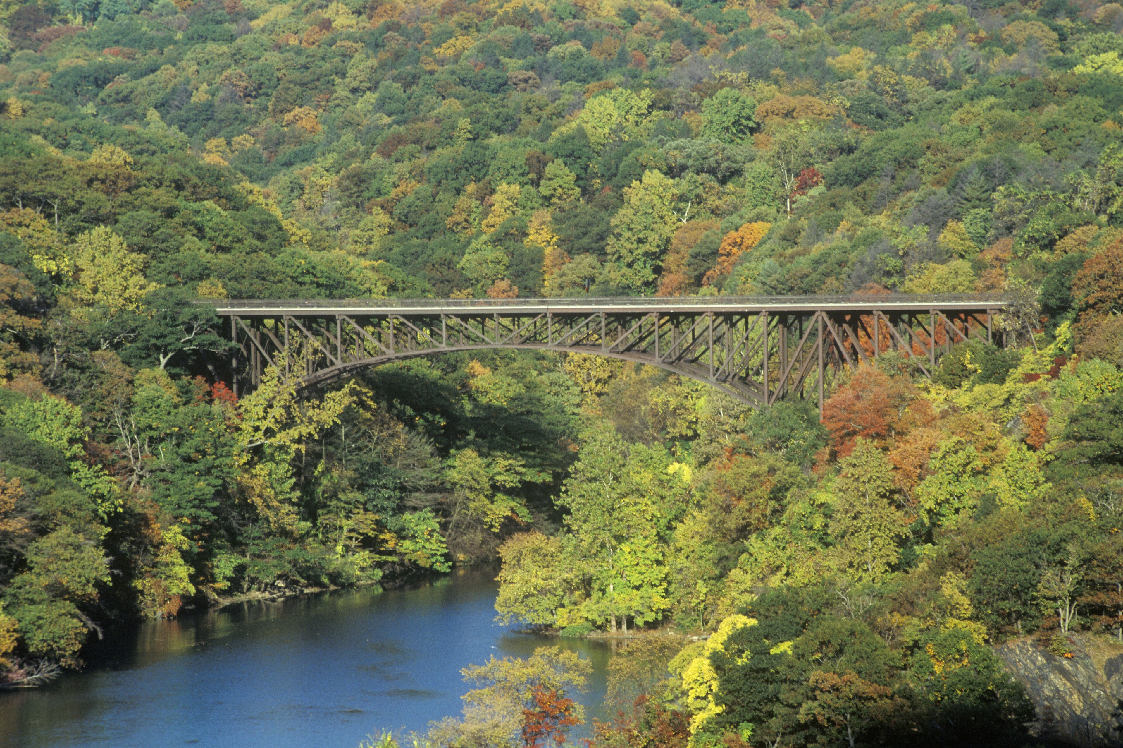 The Bear Mountain Bridge, located in Bear Mountain State Park, New York, spans the Hudson River