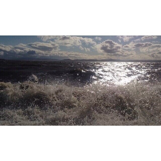 Big waves crashing in, on the beach in Ardersier. 