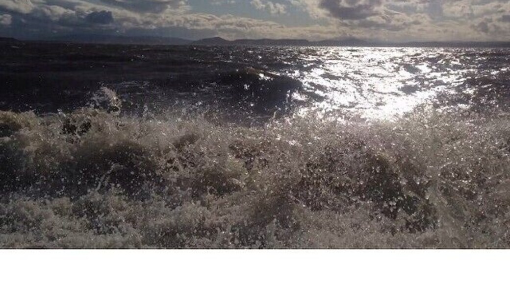 Big waves crashing in, on the beach in Ardersier.