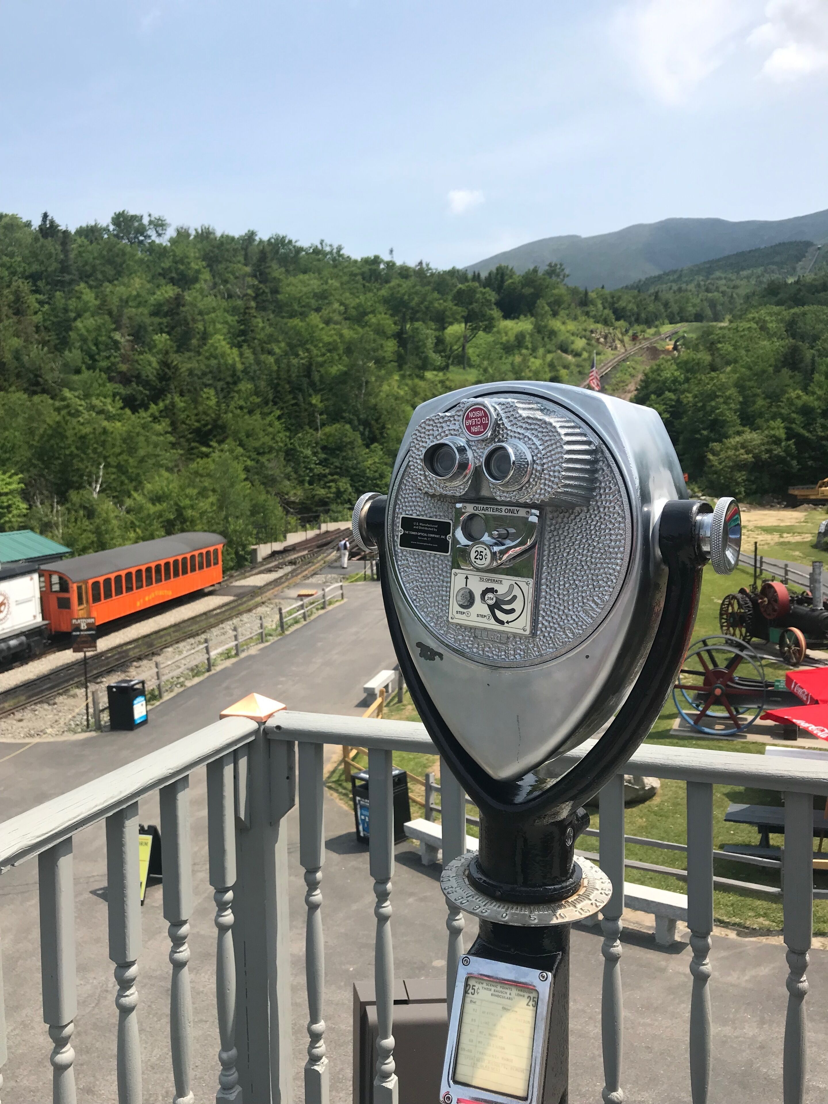 At the base station for the Mount Washington, New Hampshire cog railway. This year (2019) is the 150 Anniversary of the railway. The old steam engines have largely been replaced by diesel and as a consequence the trip up to the summit is a little faster and perhaps less cough inducing for folks who are no longer exposed to smoke from the old engines. They still run the old steam engines occasionally during the day however.