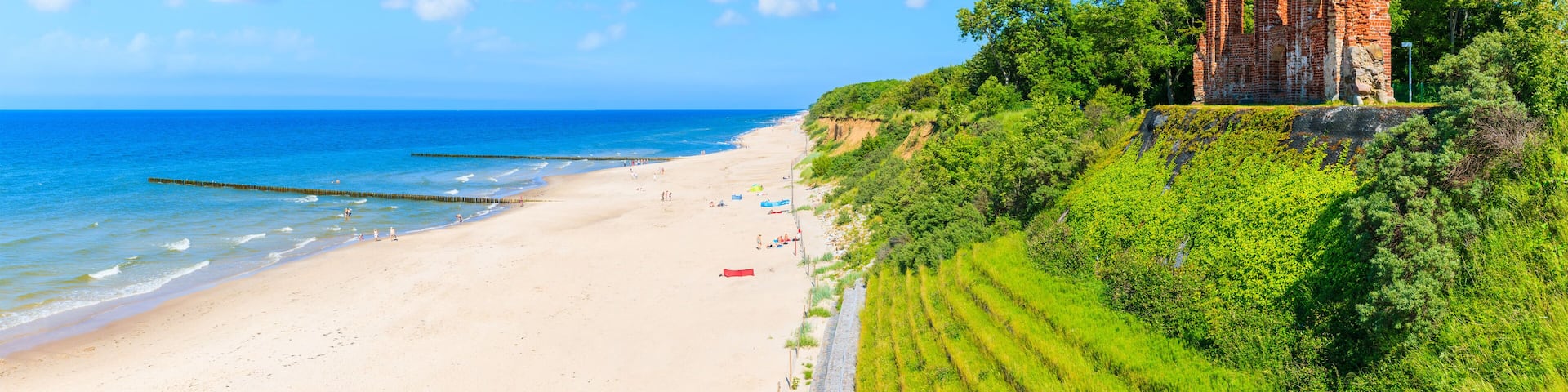 Panoramic view of ruins of old church in Trzesacz village on Baltic Sea beach, Poland