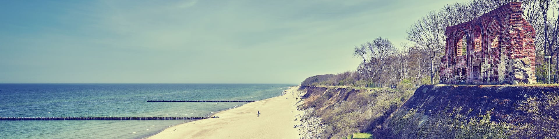 Retro toned beach in Rewal with church ruins, Poland.; Shutterstock ID 441002905