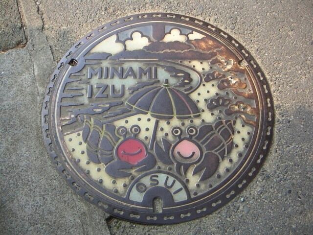 This seaside town was a great place for a weekend trip to the beach.  It was just a train's ride from Tokyo.

I had never seen coloured man hole covers before and I thought this one in particular was fantastic.  I had never photographed a manhole cover before this day :) #colorful