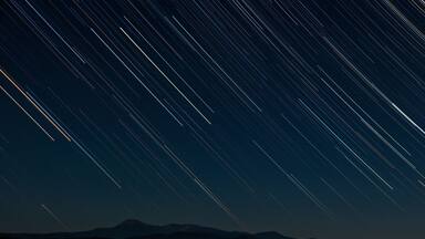 Star trails over Mount Katahdin as seen from Patten, Maine.