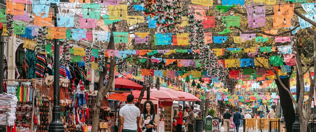 Market Square which includes street scenes and markets as well as a family