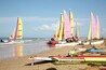 Windsurfing and sailing at Plage de la Braie.