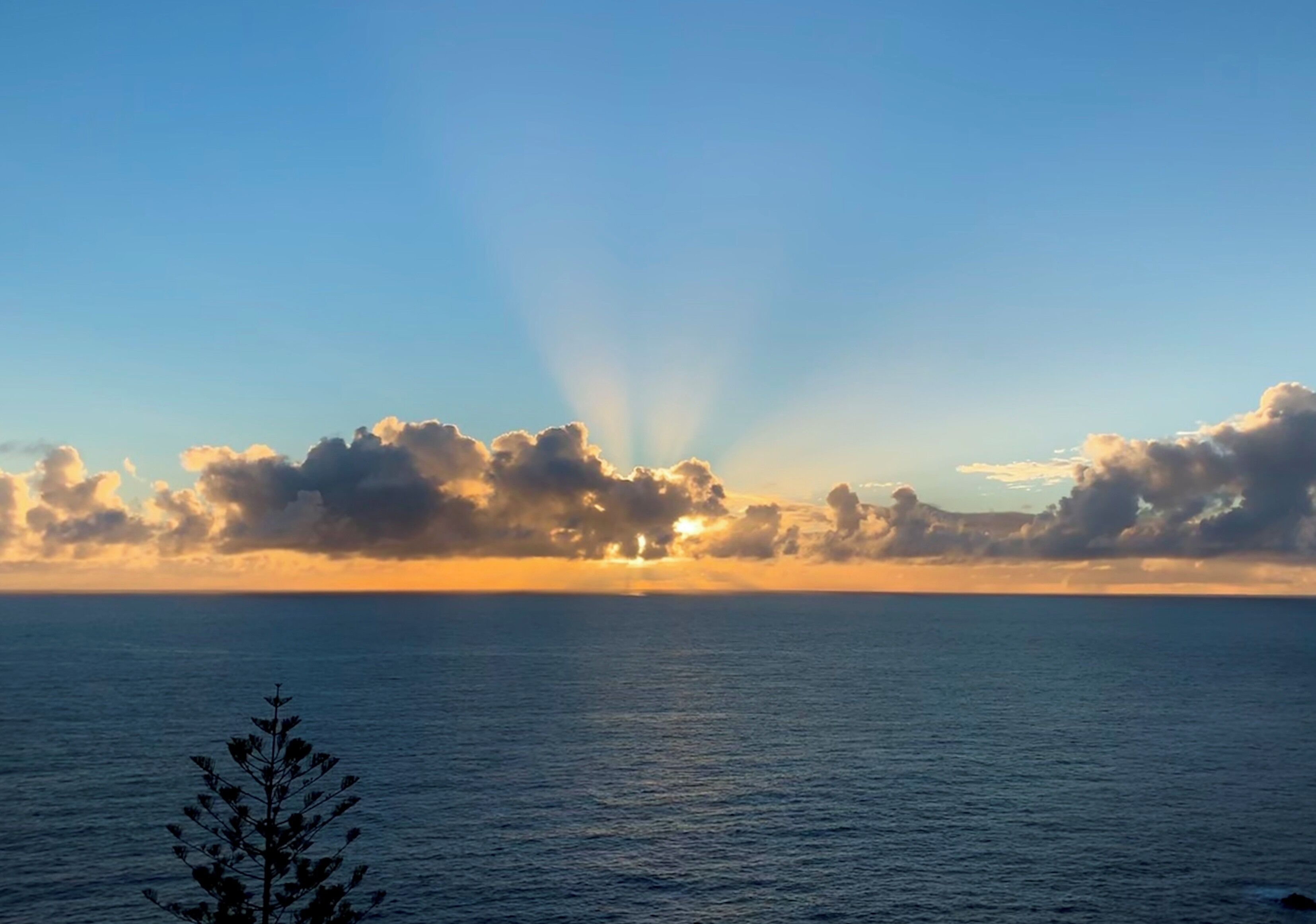 Another beautiful sunset seen from the West Coast of this little Island. It’s green, lush with a rocky coastline and scenery so stunning it’s breathtaking