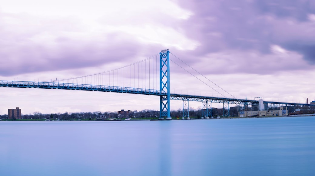 The Ambassador Bridge across the Detroit River connecting Detroit, Michigan in the United States with Windsor, Ontario in Canada, a panoramic long-exposure photography
