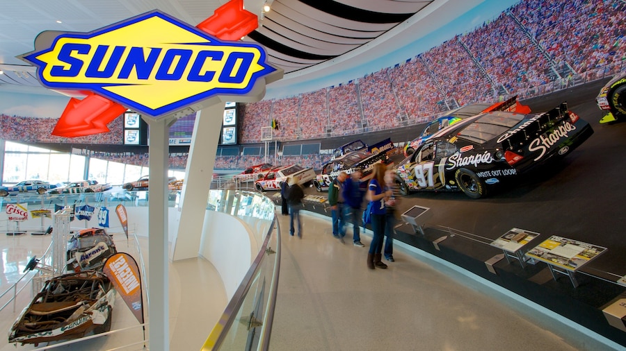 NASCAR Hall of Fame which includes interior views as well as a small group of people