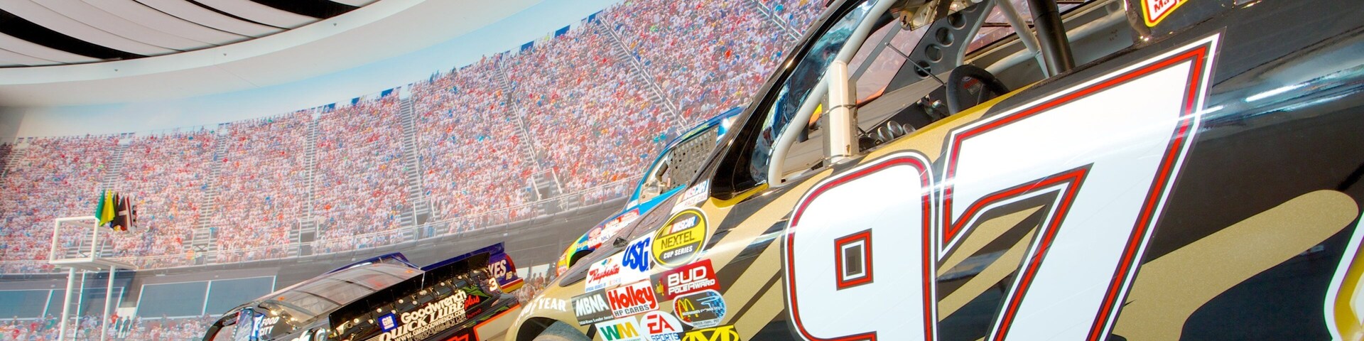 NASCAR Hall of Fame featuring a sporting event and interior views