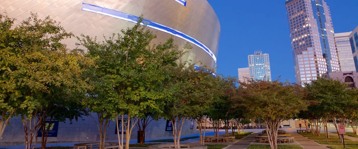 NASCAR Hall of Fame featuring a city, a garden and night scenes