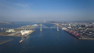 Pyeongtaek-si, Gyeonggi-do, South Korea - January 31 2022: Aerial view of Seohae Bridge and container terminal of Pyeongtaek Port