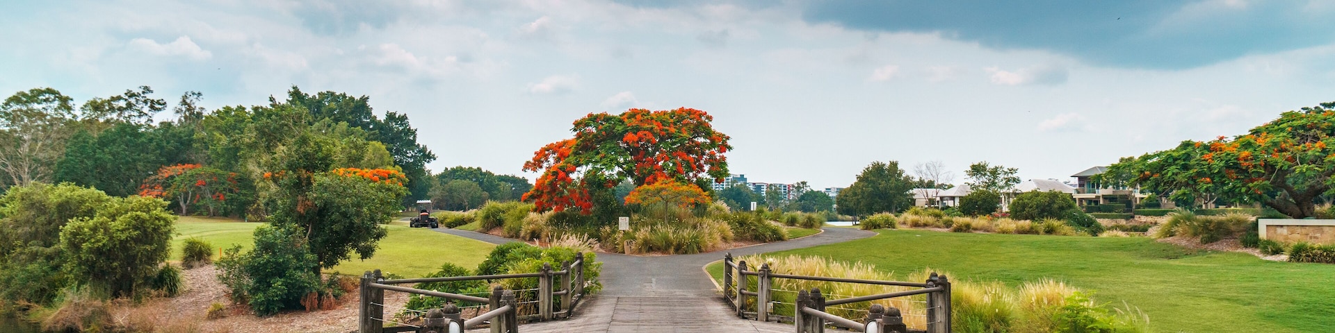 Beautiful old boardwalk at the Glades Golf Course, one of Australia’s most prestigious resort golf courses in Queensland, Gold Coast. Designed by Australian golfing icon, Greg Norman.