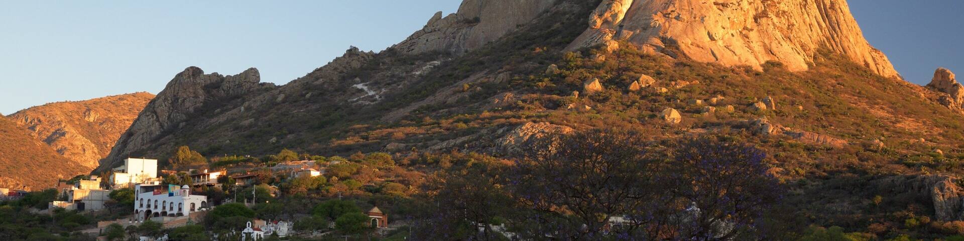 Pena de Bernal which includes tranquil scenes and mountains