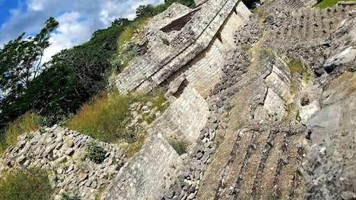 Ek Balam, now a protected ecological site in Mexico, was a predominant Mayan city between 550 AD and 850 AD with 12,000 inhabitants. The Acropolis, formerly a place of knowledge and learning, shown in the distance, features 106 steps to its peak.