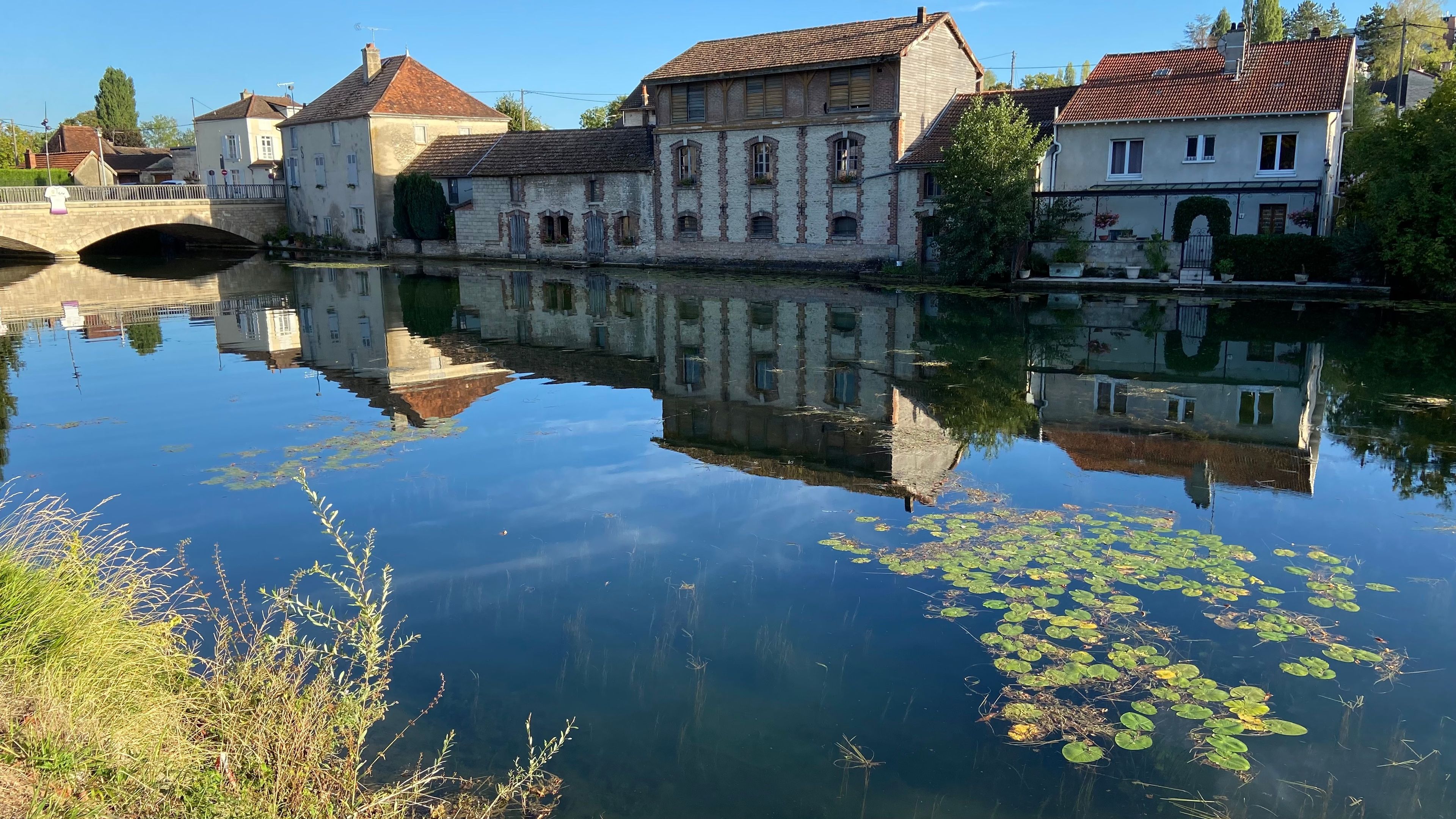 Beautiful reflections of houses in Bar sur Aube in France on August 2022