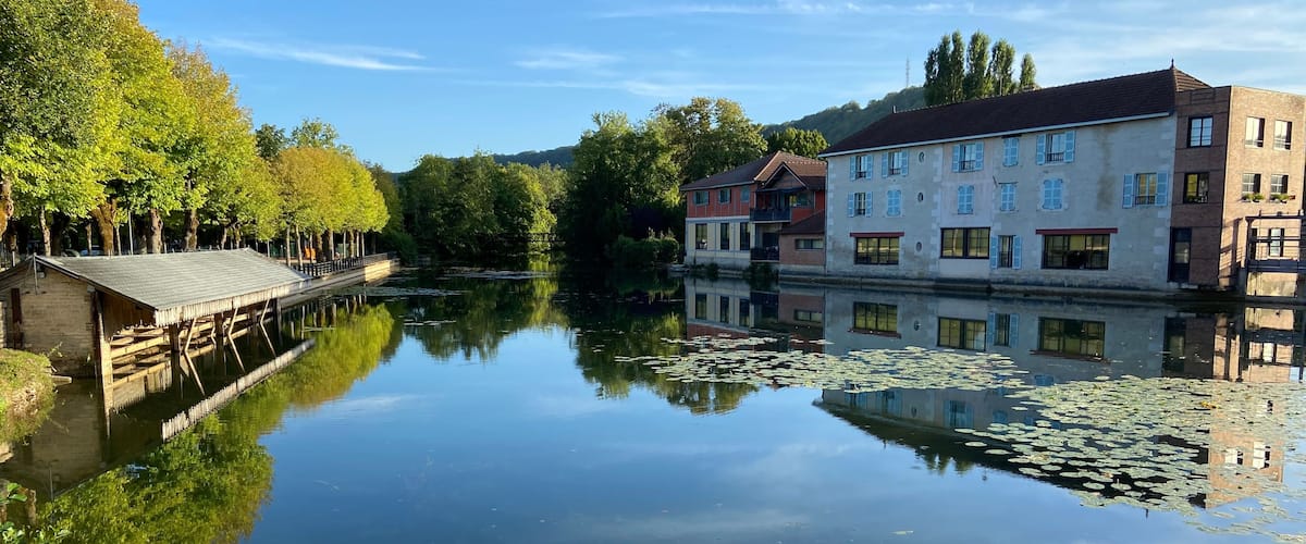Beautiful reflections of houses in Bar sur Aube in France on August 2022